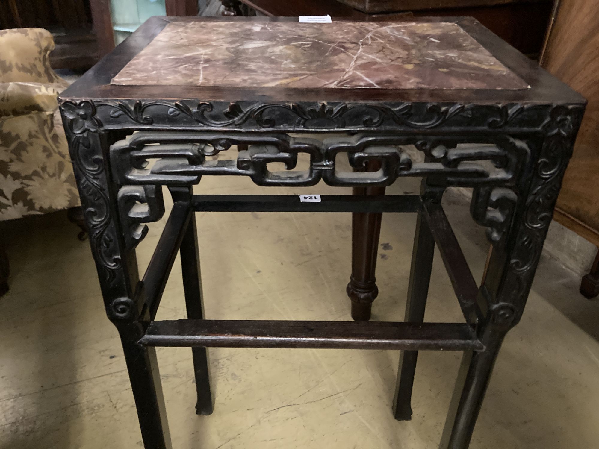 A 19th century Chinese carved hardwood rectangular topped jardiniere stand, with a rouge marble inset top, width 42cm, depth 32cm, heig